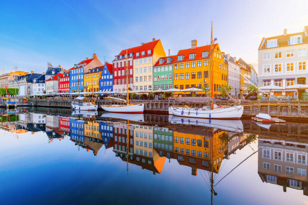 Colorful buildings and historic boats along Copenhagen’s Nyhavn canal, a familiar scene for Americans living in Denmark.