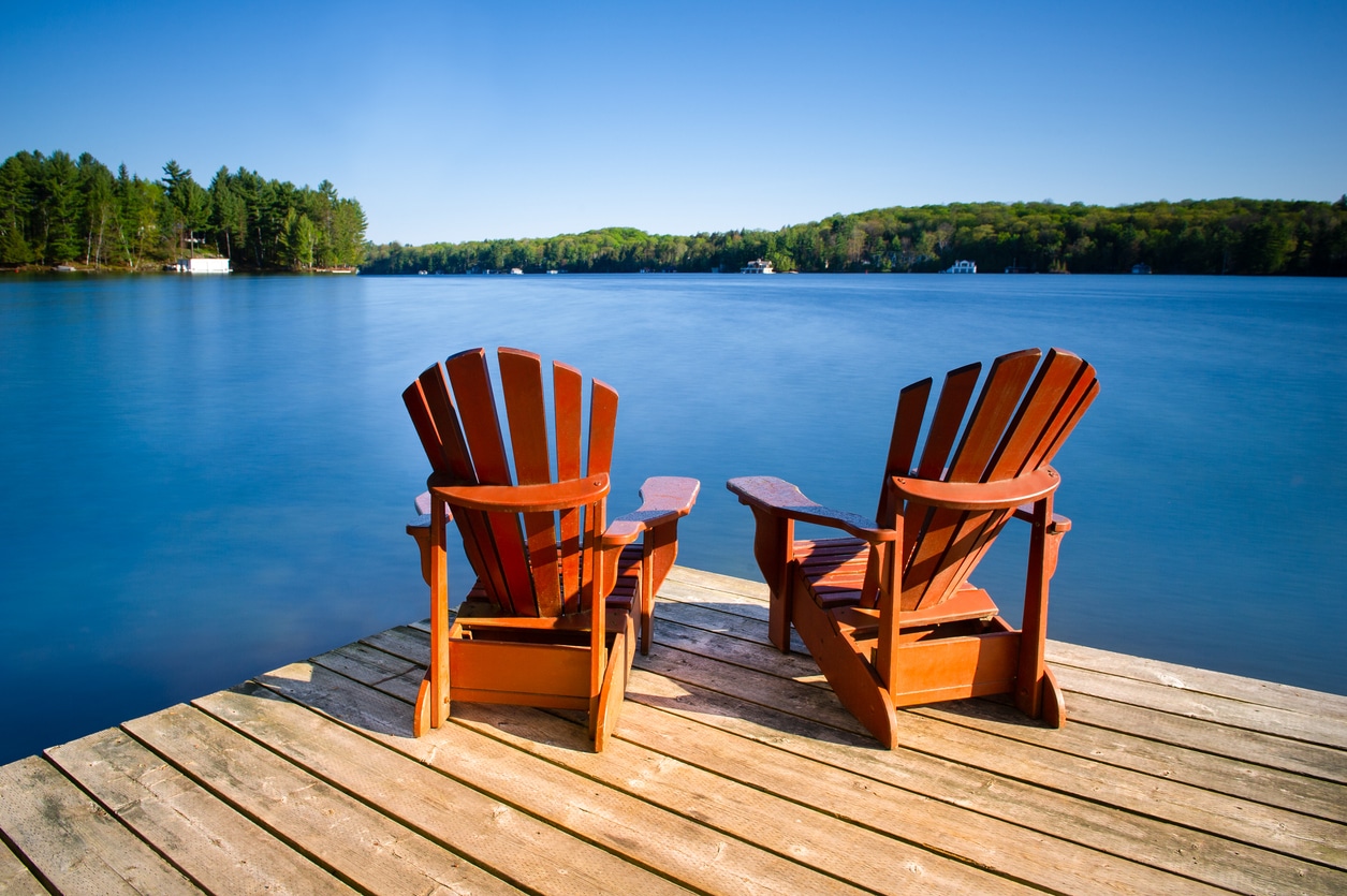 Wooden dock and calm water in Ontario—perfect setting to think about retirement options, including an IRA in Canada.