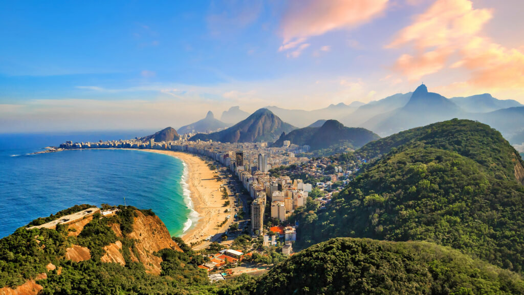 Aerial view of Copacabana and Ipanema, capturing the iconic coastal setting of Americans living in Brazil.