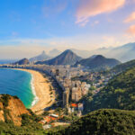 Aerial view of Copacabana and Ipanema, capturing the iconic coastal setting of Americans living in Brazil.