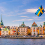 Sunset over Stockholm’s old town, showing the scenic city life of Americans living in Sweden.