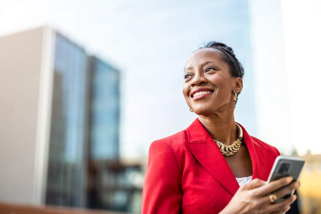Businesswoman on the move in a city setting, staying compliant with foreign operations through Form 8858.