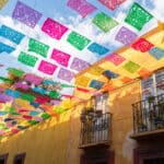 Vibrant street scene in San Miguel de Allende, a favorite destination for those looking to retire in Mexico.