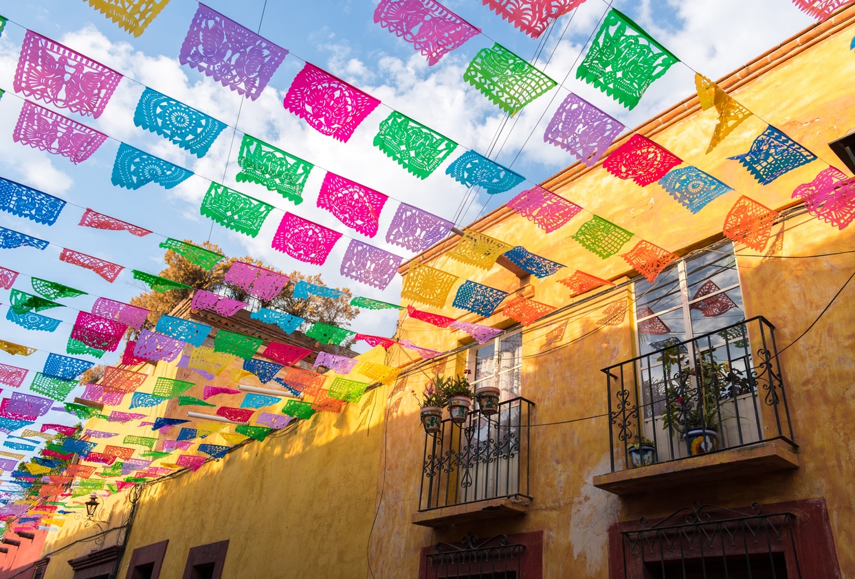 Vibrant street scene in San Miguel de Allende, a favorite destination for those looking to retire in Mexico.