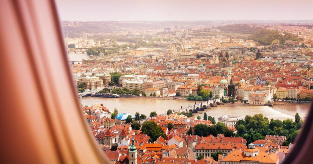 View of Prague from the window seat of an airplane
