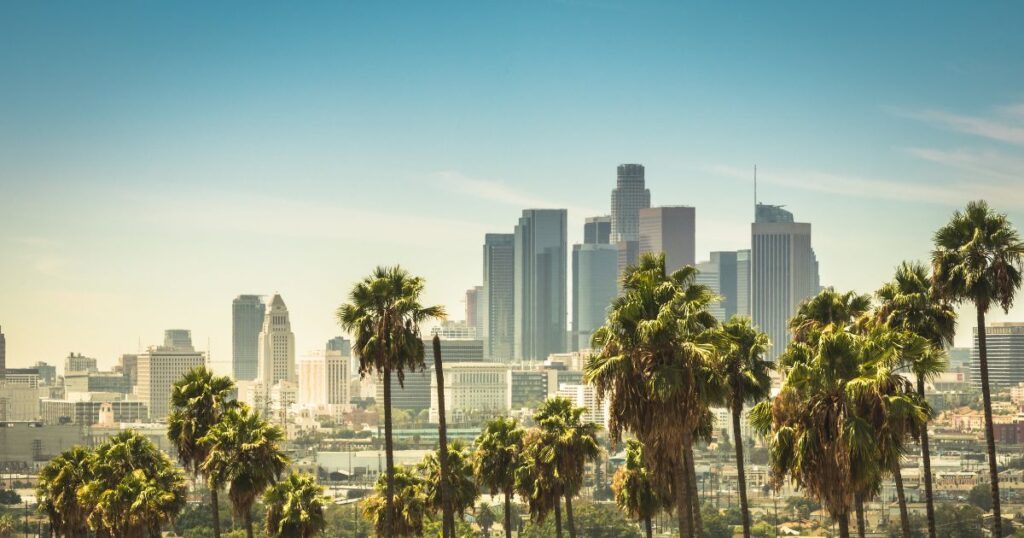 Los Angeles skyline. California is one of the most well-known sticky states, making it challenging for US citizens to change their tax residency. 