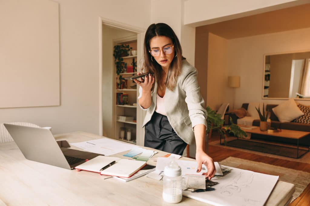 Businesswoman working from her home office, representing a small business owner who may need to file a BOIR.
