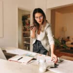 Businesswoman working from her home office, representing a small business owner who may need to file a BOIR.