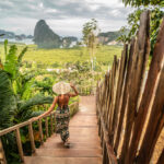 Solo traveler taking in the view of Phang Nga Bay—dreaming big with a Thailand digital nomad visa