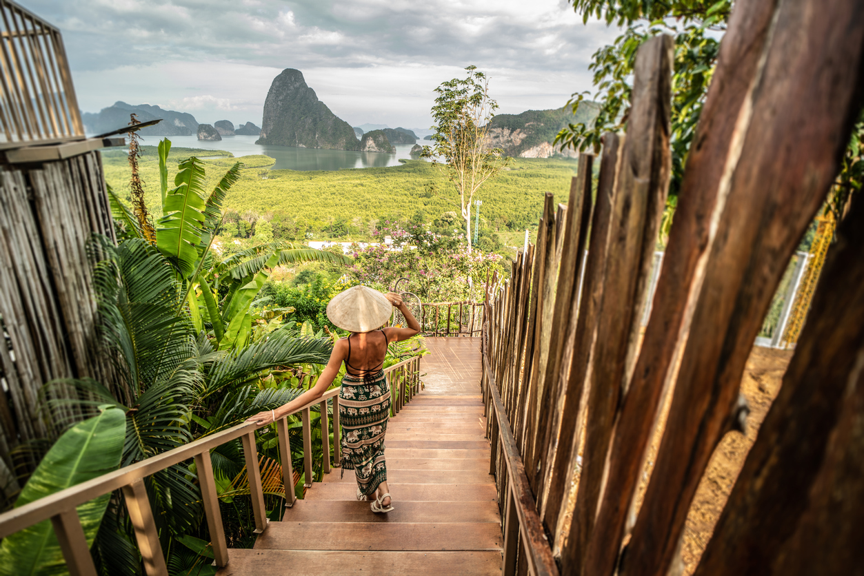 Solo traveler taking in the view of Phang Nga Bay—dreaming big with a Thailand digital nomad visa
