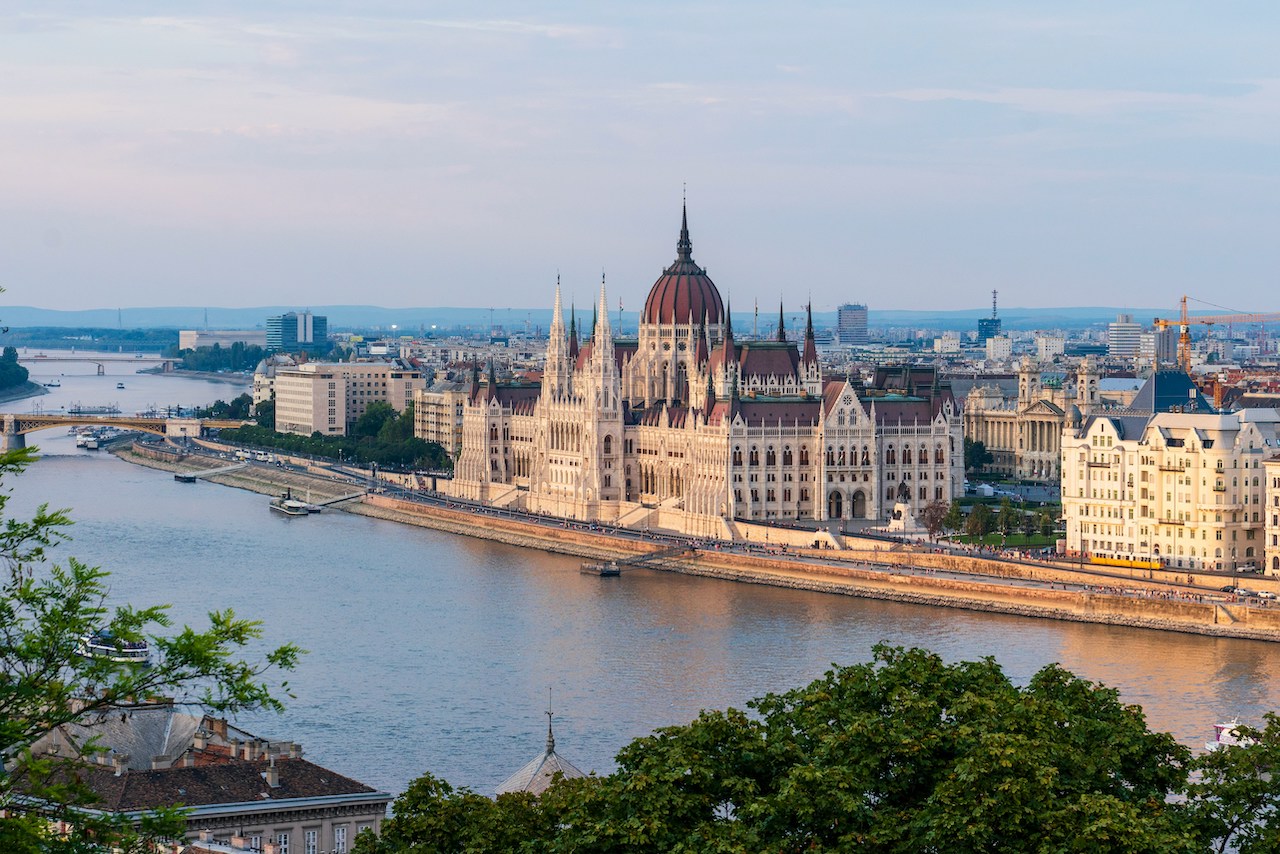 Waterside architecture in Budapest highlights the classic charm enjoyed by Americans living in Hungary.