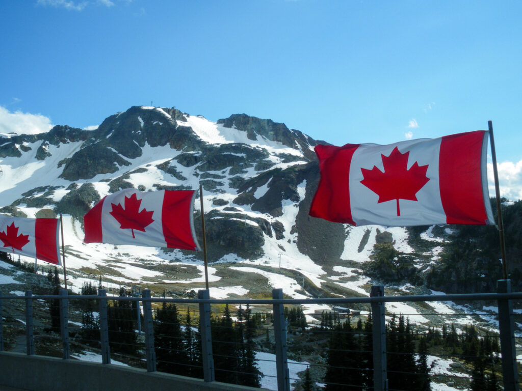 Hiking in the mountains after getting a Canada visa and exploring British Columbia’s alpine views.