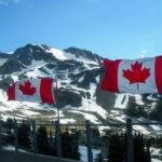 Hiking in the mountains after getting a Canada visa and exploring British Columbia’s alpine views.