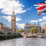 Historic landmarks and blue skies in London, where beauty meets the realities of the cost of living in the UK.