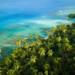 Aerial view of Buye Beach, showcasing the tropical beauty that draws many to retire in Puerto Rico.
