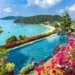 Tropical poolside view in Phuket, reflecting the serene lifestyle many seek when they retire in Thailand.
