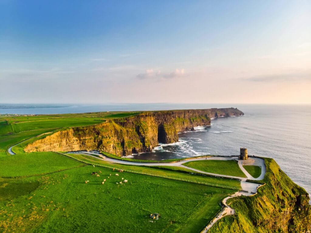 Stunning aerial view of the Cliffs of Moher, reflecting the natural beauty that draws many to retire in Ireland.
