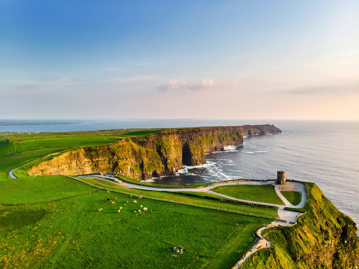 Stunning aerial view of the Cliffs of Moher, reflecting the natural beauty that draws many to retire in Ireland.