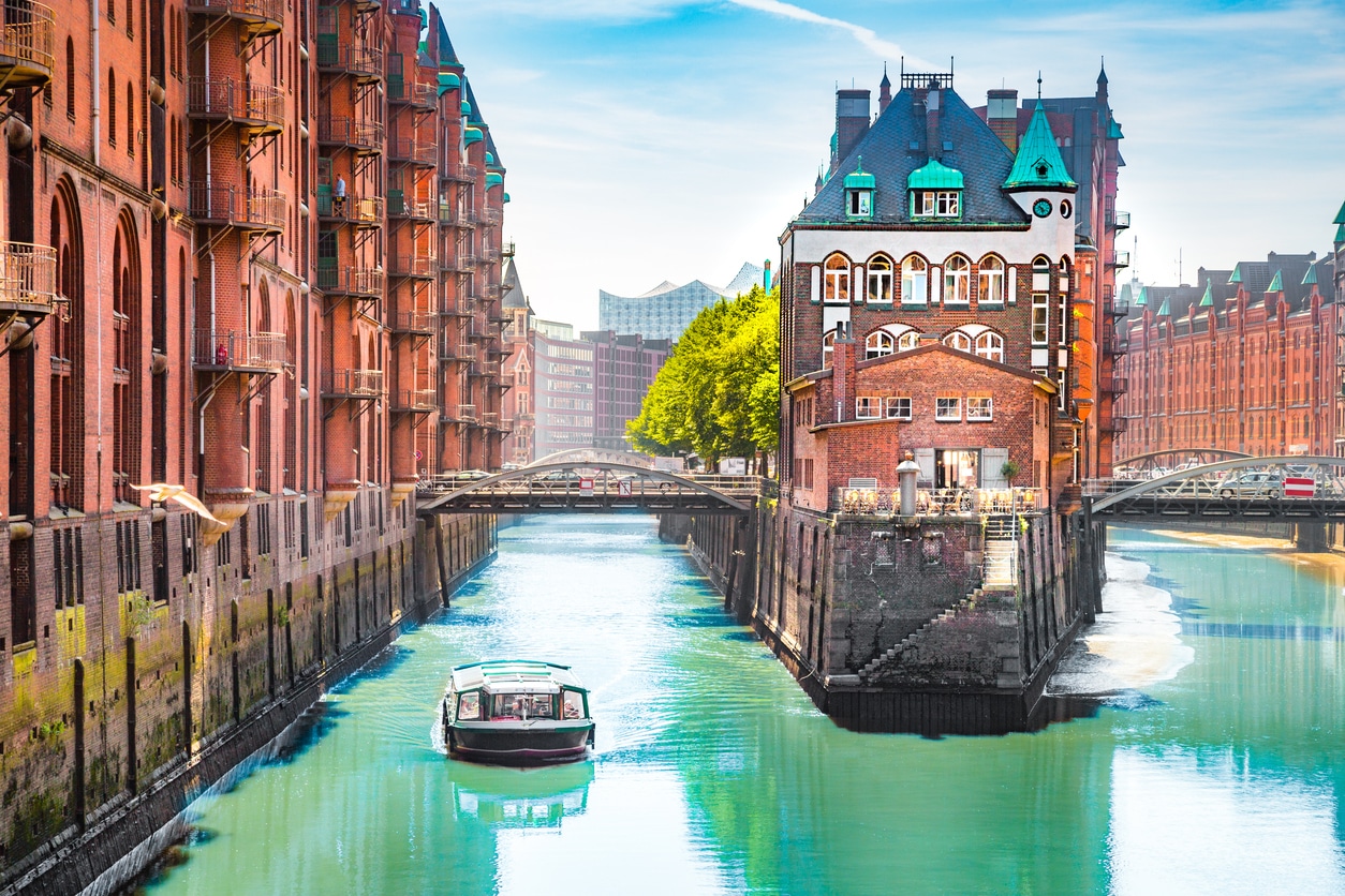 Sightseeing boat glides through Hamburg’s historic Speicherstadt, a popular destination that leads many travelers to ask: do US citizens need a visa for Germany?