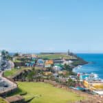 Colorful panorama of La Perla in Old San Juan, capturing the vibrant coastal neighborhoods familiar to Americans living in Puerto Rico.