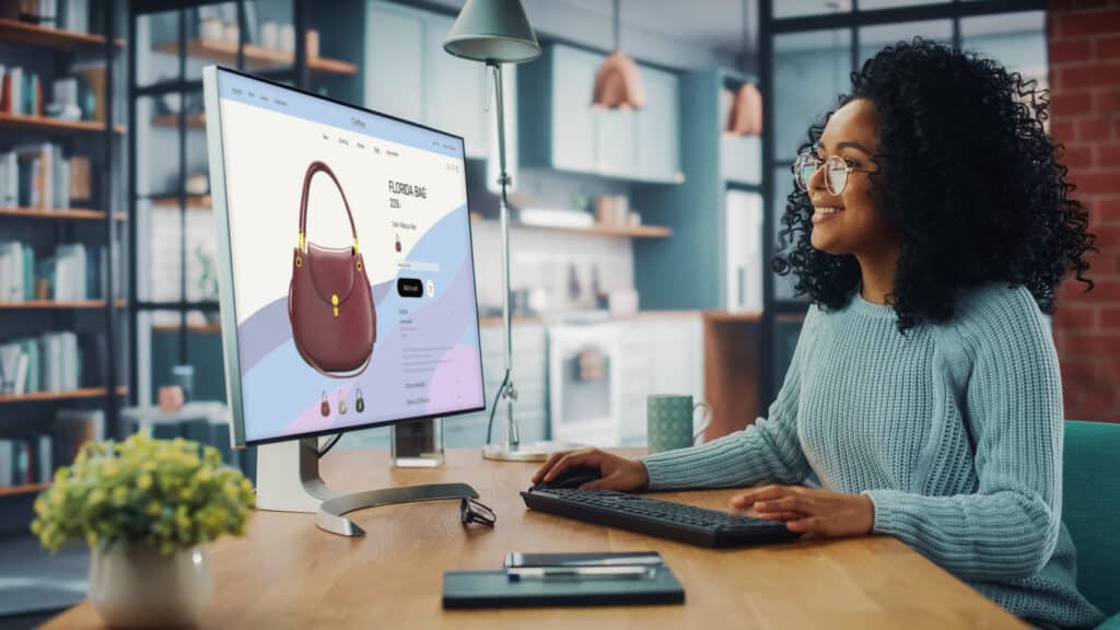 Woman shopping online from home, illustrating the kind of digital payment activity that may be reported on Form 1099-K.