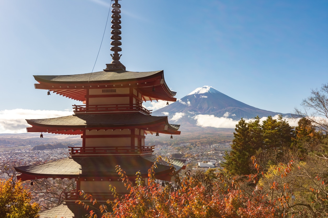 Chureito Pagoda and Mount Fuji in autumn, capturing the beauty that draws many people who want to move to Japan from US.